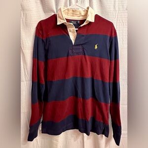 Men’s long sleeve rugby size medium. Never worn